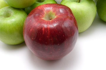 green and red apples on white background