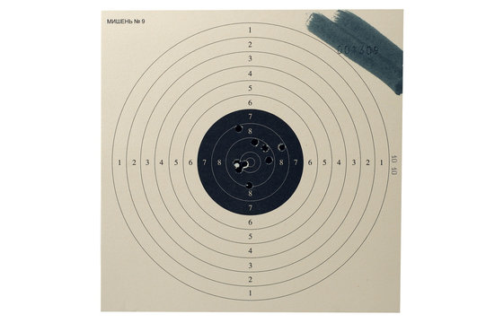 paper target with shot signs