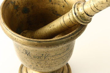 ancient bronze mortar with pestle