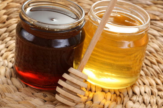 two jars of sweet honey - nutrition concept