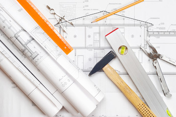 Tools over house plan blueprints