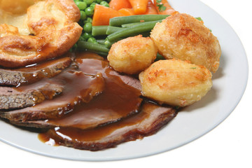 Roast beef with Yorkshire pudding, vegetables and gravy