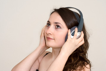 Young woman listening music