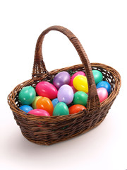 Wicker Easter Basket with colorful eggs 1