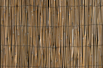 Bamboo Wall With Metallic Braces Background; close up.