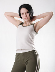 Young beautiful woman during fitness time and exercising.