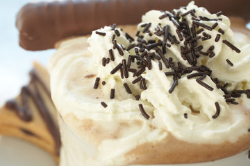 Fresh foamy cappuccino in white coffee cup 