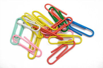 multicolored paper-clip on the white isolated background
