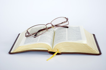 Spectacles and book 