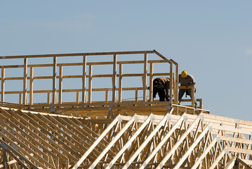 Workmen on top of building