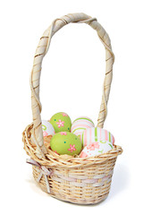 Wicker basket with easter eggs.