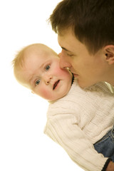 young boy on father's hands