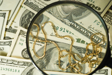 Fototapeta na wymiar view of the money through a magnifier