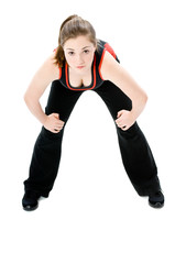 A young caucasian girl doing different stretches