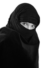 Naklejka premium glance of woman in black shawl, isolated on white