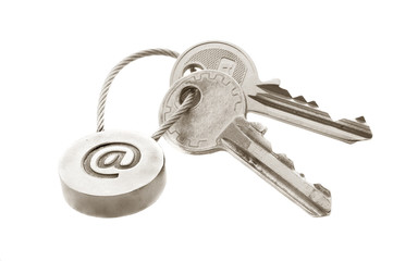 Two keys with e-mail symbol isolated over white