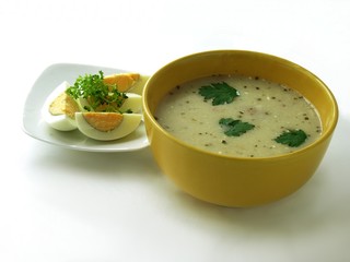 sour rye flour soup with boiled eggs for lunch