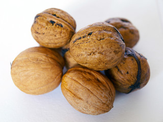 A stack of fresh walnuts.