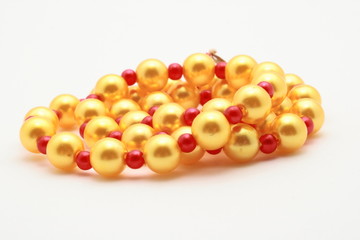 Yellow beads on white