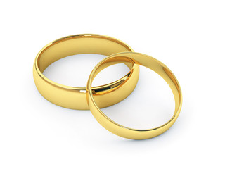 Wedding golden rings one over another. Isolated.