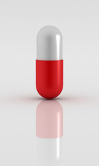 3d Rendered pill on reflective white plane
