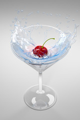 Cherry diving in cocktail glass