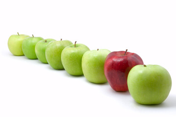 green and red apples on white