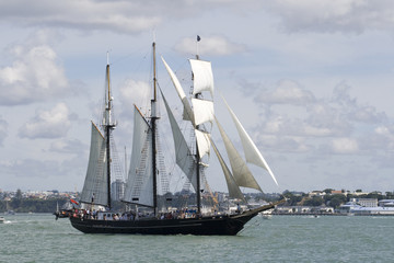 Fototapeta na wymiar Tall Ship - A Black Brigantine Side On