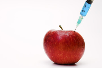 apple with syringe