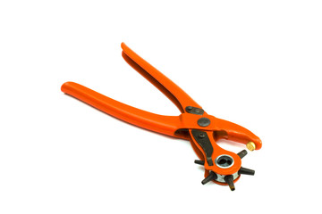 A leather punch on a white background