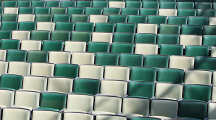 Empty seats at an event. They are two different colors