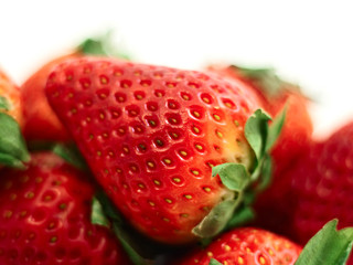 strawberries (shallow DOF) isolated on white background