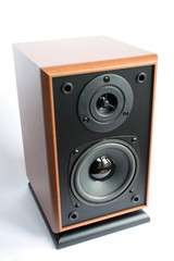 Obraz premium On a photo the speaker of black color in a wooden box. 