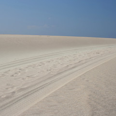 tyre tracks across sand