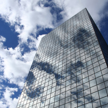 Reflection Of Clouds On Skyscraper