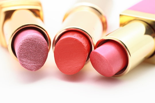 Three reddish lipsticks
