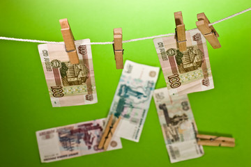 Russian bank note wear out over green background