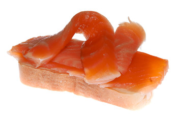 White bread with salmon slices, isolated on white