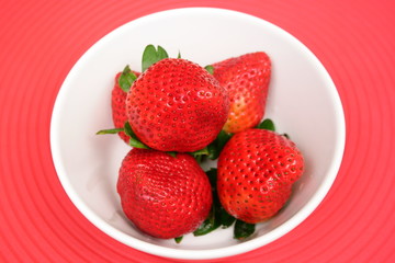 strawberries in a  bowl