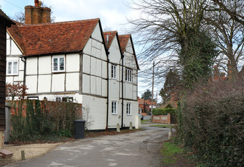 A Village Street in Rural England with a Timber Framed house