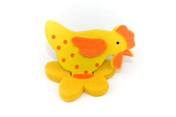 One small toy chicken a over white background