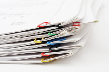 Pile of sheets of paper fastened by paper clips