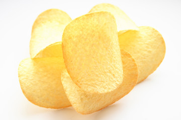 On a photo potato chips. The photo is isolated.