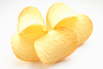 On a photo potato chips. The photo is isolated.