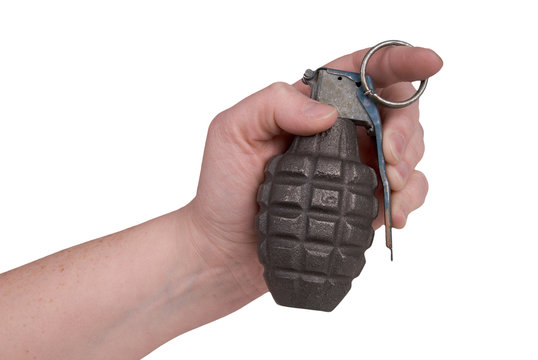 Hand grenade in a woman's hand 