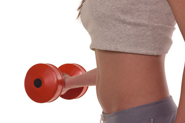 Fitness girl training her body with dumbbell