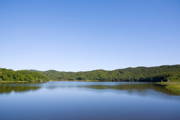 Fototapeta na wymiar Blue lake in the evening