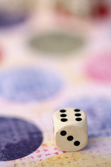 playing with several white dices on various backgrounds..