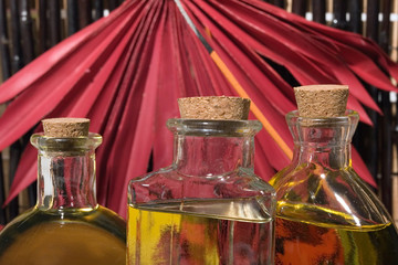 Essential body massage oils in bottles