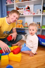 Fototapeta na wymiar father and child in playroom 2